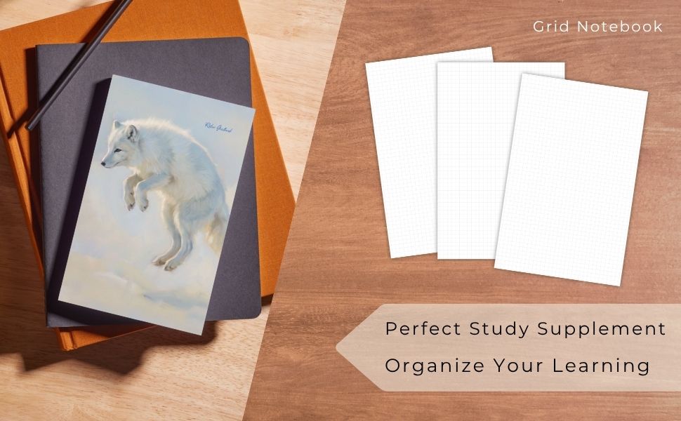 Notebooks with a wolf illustration and blank pages on a wooden surface