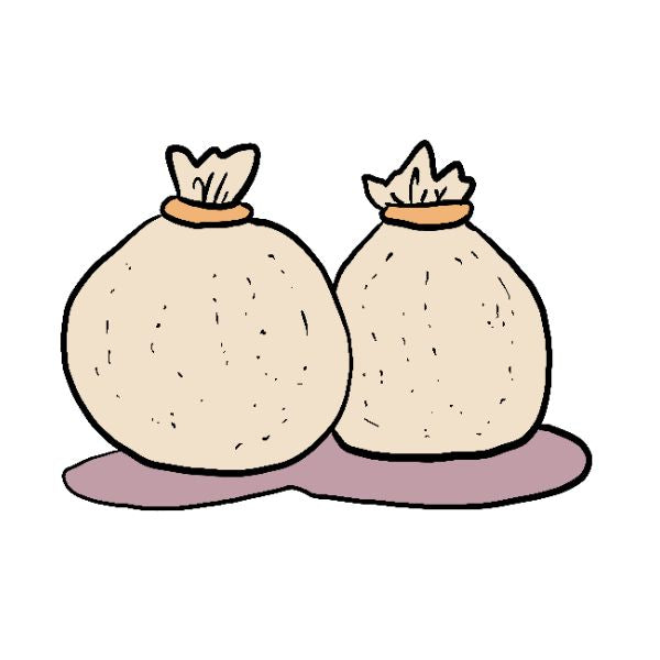 A simple line-art illustration of two round beige objects with small orange bands, sitting on a mauve oval base against a white background.